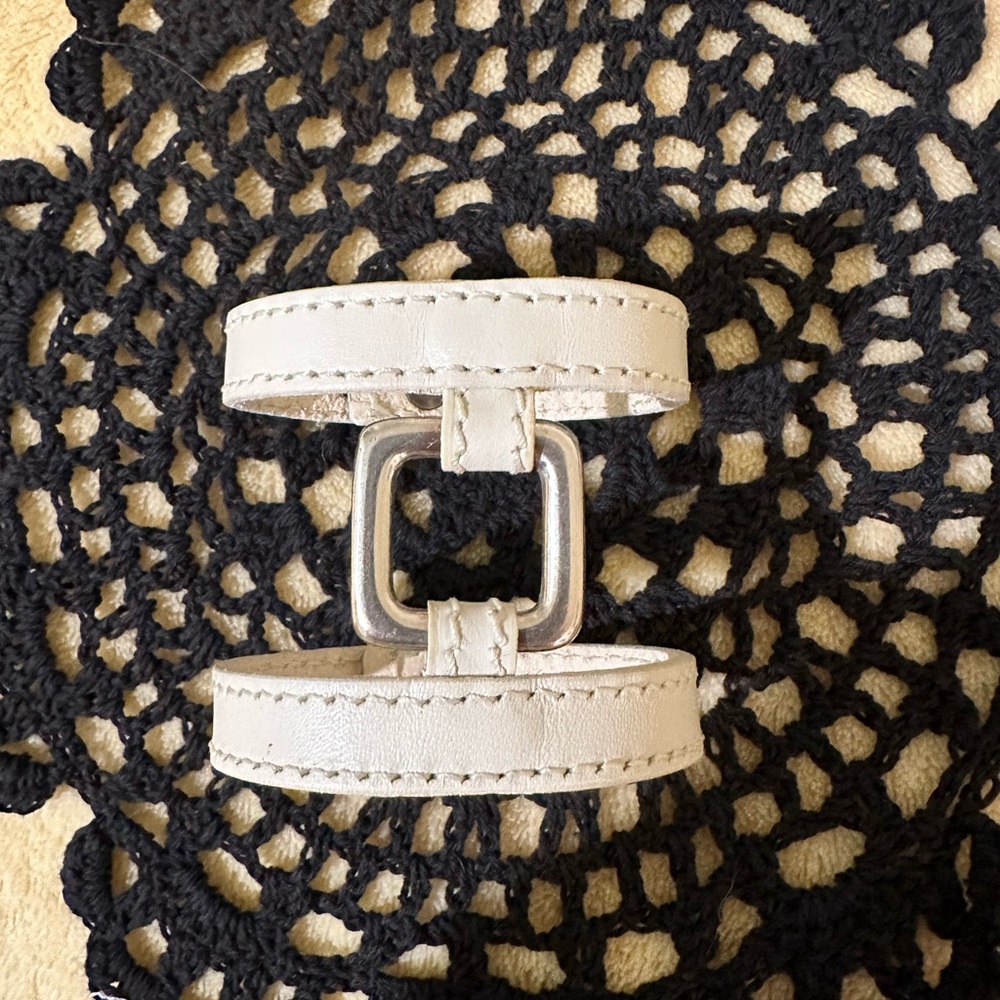 White leather double strap bracelet with silver square purchased at Guess Store